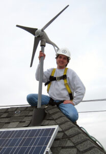 Charles installing wind turbines